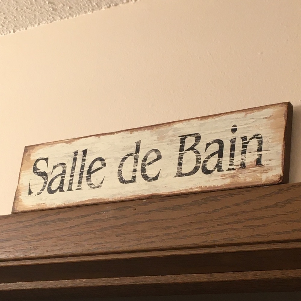 Vintage looking French bathroom sign